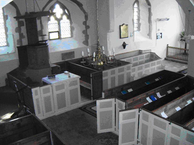 Photograph of pews within the church